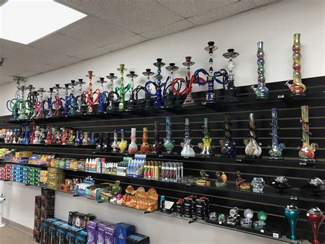 What time does smoke shop close near me - At the time of purchase, customers are given the chance to choose amongst four games – darts, plinko, spin the wheel, or hula hoops – to earn a discount of up to 50% off on their items. ... this place is so unique unlike other smoke shops! Alex N. Las Vegas, NV. Checkout more reviews on Yelp. Smokes Mart. OPEN 24/7 | DELIVERY 24/7. Products ...
